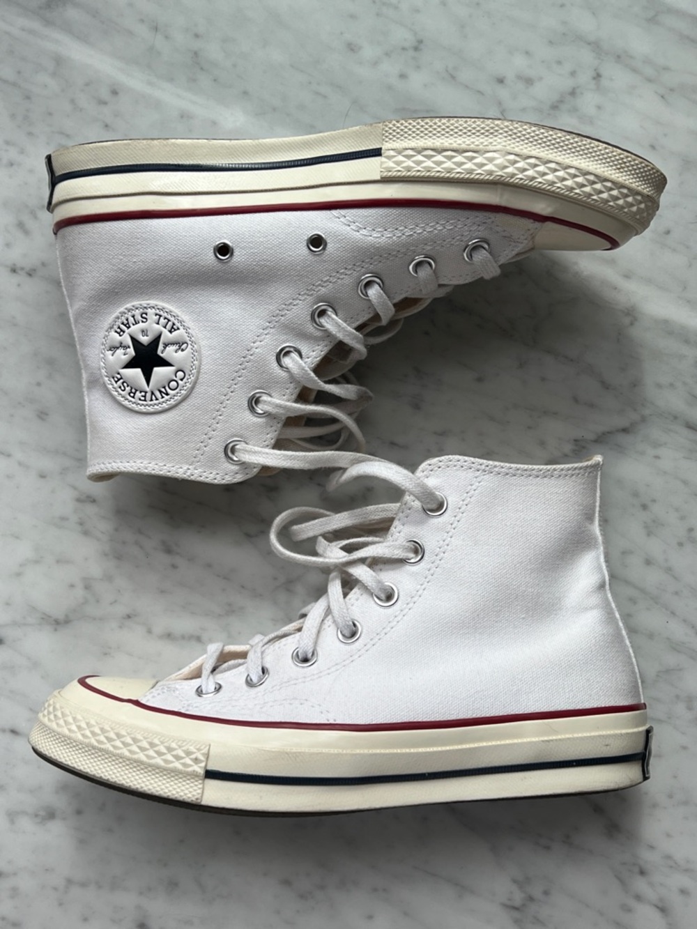 3 for $60 | Chuck Taylor White High-Top Canvas Sneakers with Red Trim 6.5